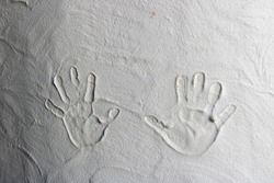 hand prints on cement
