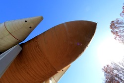 Main Propulsion Test Article External Tank (MPTA-ET) and the nose cones of two Space Shuttle Solid Rocket Boosters (SRBs) in Huntsville, Alabama