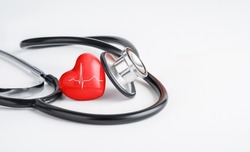 Red heart and stethoscope. Cardiology, heart health and care, Health Day concept. Copy space.