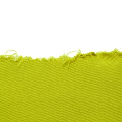 Yellow green background with torn ragged edge. Frame isolated on a white background. Fabric texture, sewing material, torn cloth. Cut piece of fabric. Template, background, empty space.
