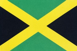National flag of Jamaica close-up on fabric base
