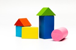 house toy blocks isolated white background, little wooden home, A partially constructed home, built from colorful wood blocks building isolated on white background. Colourfull shapes with blocks