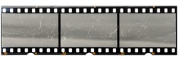 original 35mm filmstrip with empty dusty frames or cells and nice texture on the border, fluffs on film material, real film grain