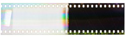 Beginning of 35mm negative film strip, first frame on white background, real scan of film material with funny scanning light interferences on the film material.
