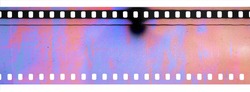 real scan of 35mm cine film material with broken scanner, scanning light interferences on long filmstrip, dusty film texture.
