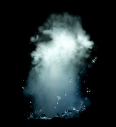 highspeed photo of small water explosion with smoke and splashing water drops isolated on black background.