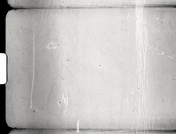scan of blank or empty super 8 film frame with black filmborder and scratches. photo placeholder.