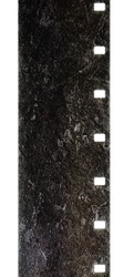scan of 16mm or cine film strip on white, burned film material, film perforation.