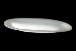 Unidentified Flying Plate. Isolated on a black background