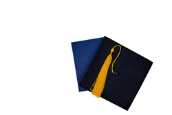 Graduation cap and diploma isolated on white background. Graduation concept. Black Mortar Board Cap, top view.