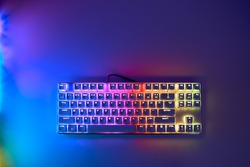 Mechanical gaming keyboard with backlight, top view. Gaming keyboard with RGB backlight. RGB LED keyboard.