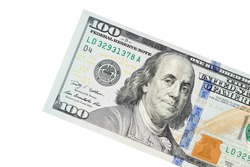 Portrait of Benjamin Franklin from one hundred dollars bill new edition macro.