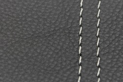genuine leather texture with a decorative seam