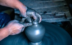 making traditional method handmade clay pottery pot at Bhaktapur, Nepal.