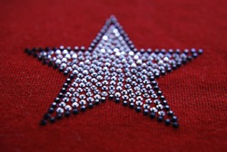 Rhinestones on fabric, background and texture for design.