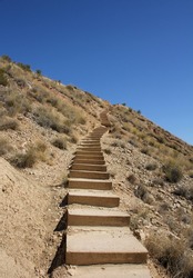 Stairs to the top of a small desert mountain in the Bárdenas Reales in Navarra, Spain