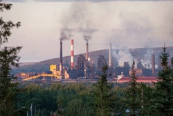 Chimneys of big factory polluting sky