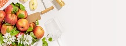 Food banner with farm apples, bottle of apple cider, glass and corkscrew on white background with copy space. Summer, Low-alcohol, fruit drink. Fruit wine. Apple product. Soft focus style, banner size