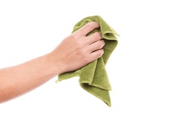Hand holding green duster microfiber cloth used for cleaning isolated on white background