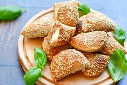 Fresh baked home made whole wheat  Gliten free  Mini cheese  puff pastries  .Cheese pie with phyllo pastry and herbs