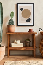Creative composition of stylish living room interior with mock up poster frame, wooden shelf, cacti and personal accessories. Plant love and nature concept. Template.