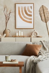 Elegnat living room interior design with mock up poster frame, grey corner sofa, coffee table and personal accessories. Pastel neutral colours. Template.