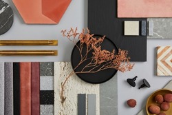 Creative flat lay composition with textile and paint samples, panels and tiles. Stylish interior designer moodboard. Pink, black and light grey color palette. Copy space. Template. 
