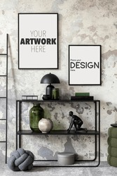 Industrial interior design of living room with mock up poster, black sideboard, ladder and personal accessories. Home decor. Template.