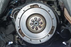 Close-up of Flywheel assembly in Rear Wheel Drive manual transmission vehicle.