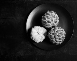 close up fruits sugar apple with black and white photo