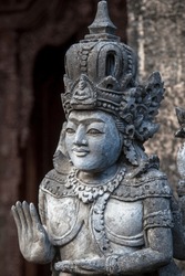 Statues and sculptures carved in stone. Details of famous balinese temples. Bali, Indonesia