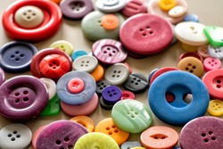 Many colorful garment buttons in various shapes and sizes
