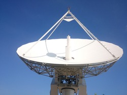 Satellite control antenna under cloudless blue sky