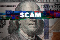 Abstract glitch with word SCAM on 100 Dollar bill. Ideas for Online scam, Fraud, Hacker, Black money scam, Cryptocurrency scammers