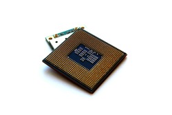 processor for a computer lies on a white isolated background