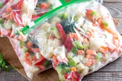 Frozen vegetables in bags, cold healthy diet food, freeze. Frozen food