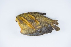 Deep fried dried skin Gourami Fish (Pla said fish or Sepat siam) on white background.