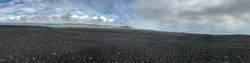 Reynisfjara Black Sand Beach, Iceland. World-famous beach found on the South Coast of Iceland, beside the small fishing village of Vík í Mýrdal. Roaring Atlantic waves and beautiful panoramas.