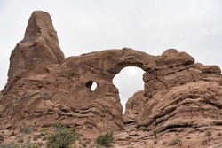 Arches National Park, Utah, USA. Double Arch. Close-set pair of natural arches. It is what is known as a pothole arch. it formed by water erosion from above rather than more typical erosion.