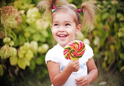 Girl eating a candy