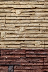 Limestone wall. Samples of decorative siding stone. Mosaic of abstract geometric pattern of limestone tile wall. Limestone siding. Background and textures.