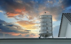 scenic sky on the roof of stainless steel storage water tank