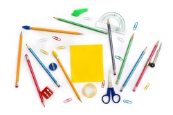 Back to School. School supplies ( yellow sheet, pencil, scissors, sharpener, clips, crayons ) on a white background. Top view, flat lay