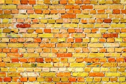 Vibrant brick wall texture pattern stone masonry background. Backdrop texture masonry wall brick background. Old yellow brick texture rough masonry backdrop or brickwork pattern. Old brickwork texture