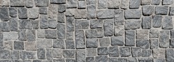 Paving stone pavement texture. Cobblestone pavement top view. Old stone sidewalk. Paving texture. Cobble stone road cobble texture. Cobblestone background. Old pavement background. Cobblestone road