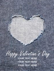 Heart shape ripped jean denim texture for Valentine's card background