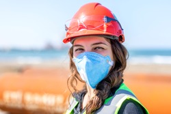 Occupational safety and health specialist with face mask for coronavirus (covid-19). Occupational health is a multidisciplinary field of healthcare concerned with enabling an individual.