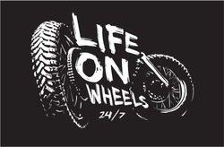 life on wheels slogan with bike wheels illustration