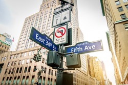 Street sign of Fifth Ave and East 34th Street in Manhattan, New York