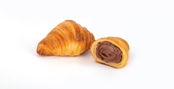 Fresh croissants with chocolate. Croissant with chocolate filling with shadows on a white background. Fresh french croissant. Italian pastry